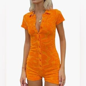 Woman’s Orange Romper - Short Sleeve, Polo Neck. Button Front. Size Large